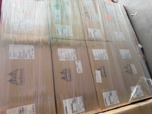 Factory-sealed NVIDIA Mellanox MFS1S00-H090V cases palletized in our warehouse